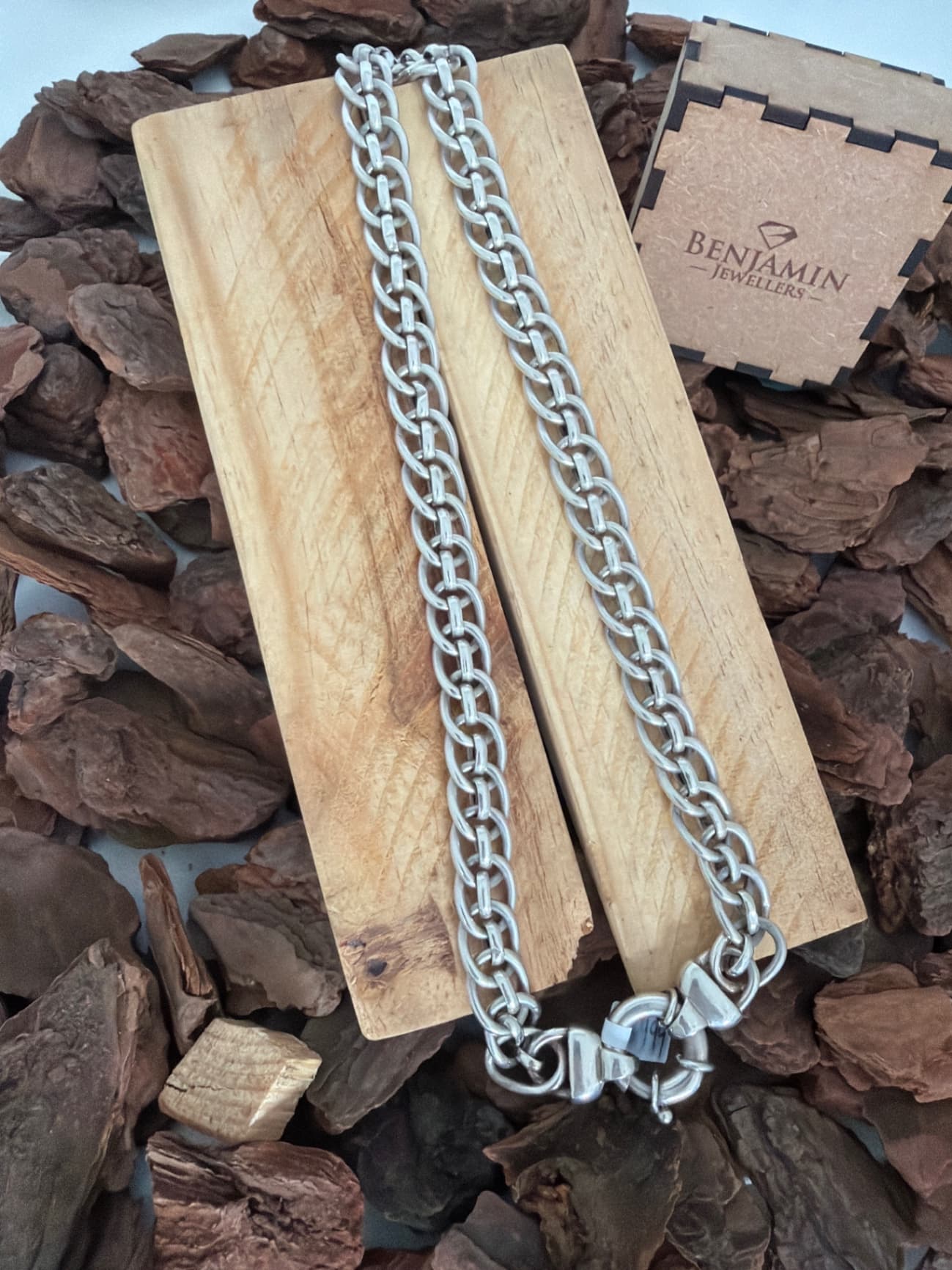 Silver Solid Curb (Gourmet) link chain with a Signoretti clasp closure